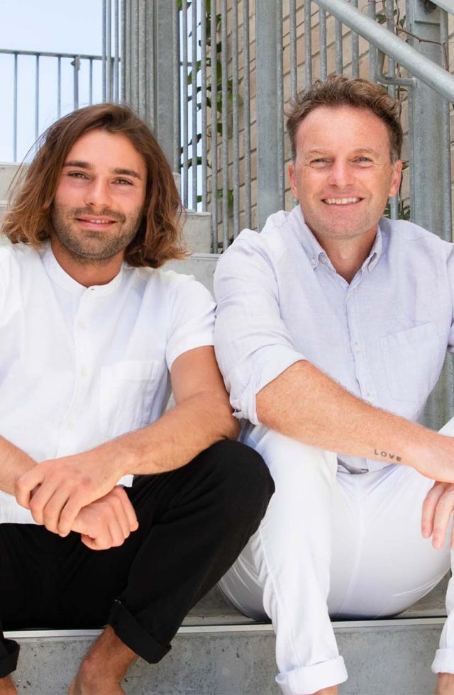 men-sitting-on-stairs